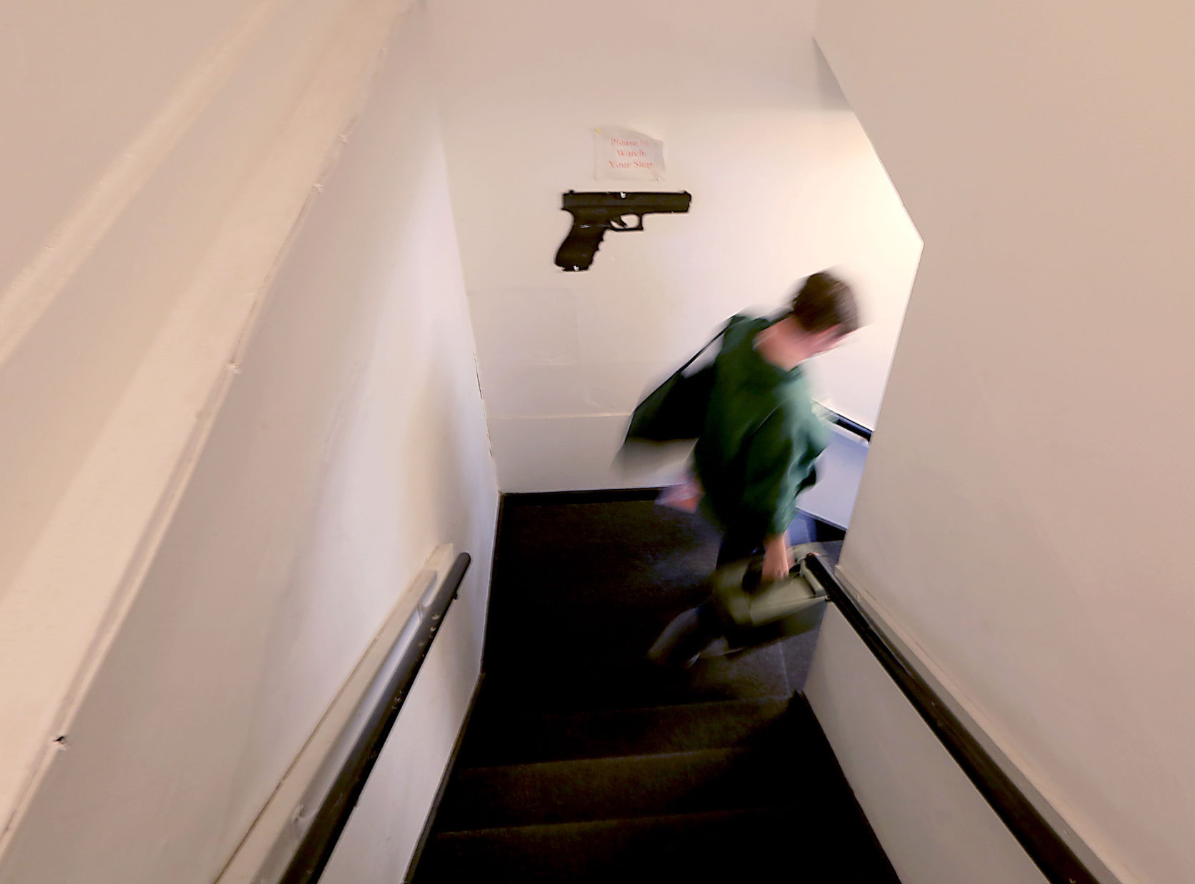 Person walking down stairs